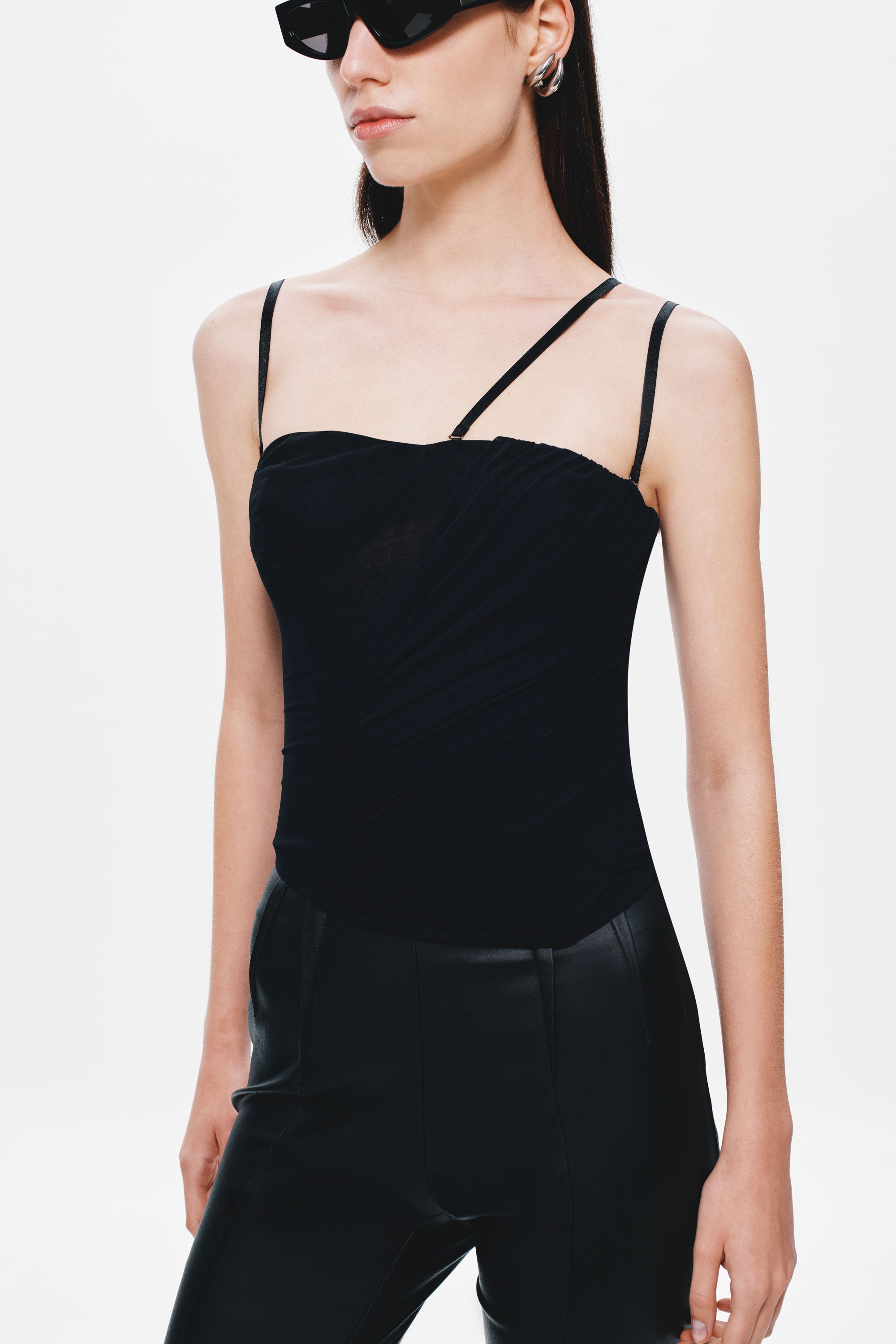 Black mesh corset top close-up with sweetheart neckline and narrow shoulder straps