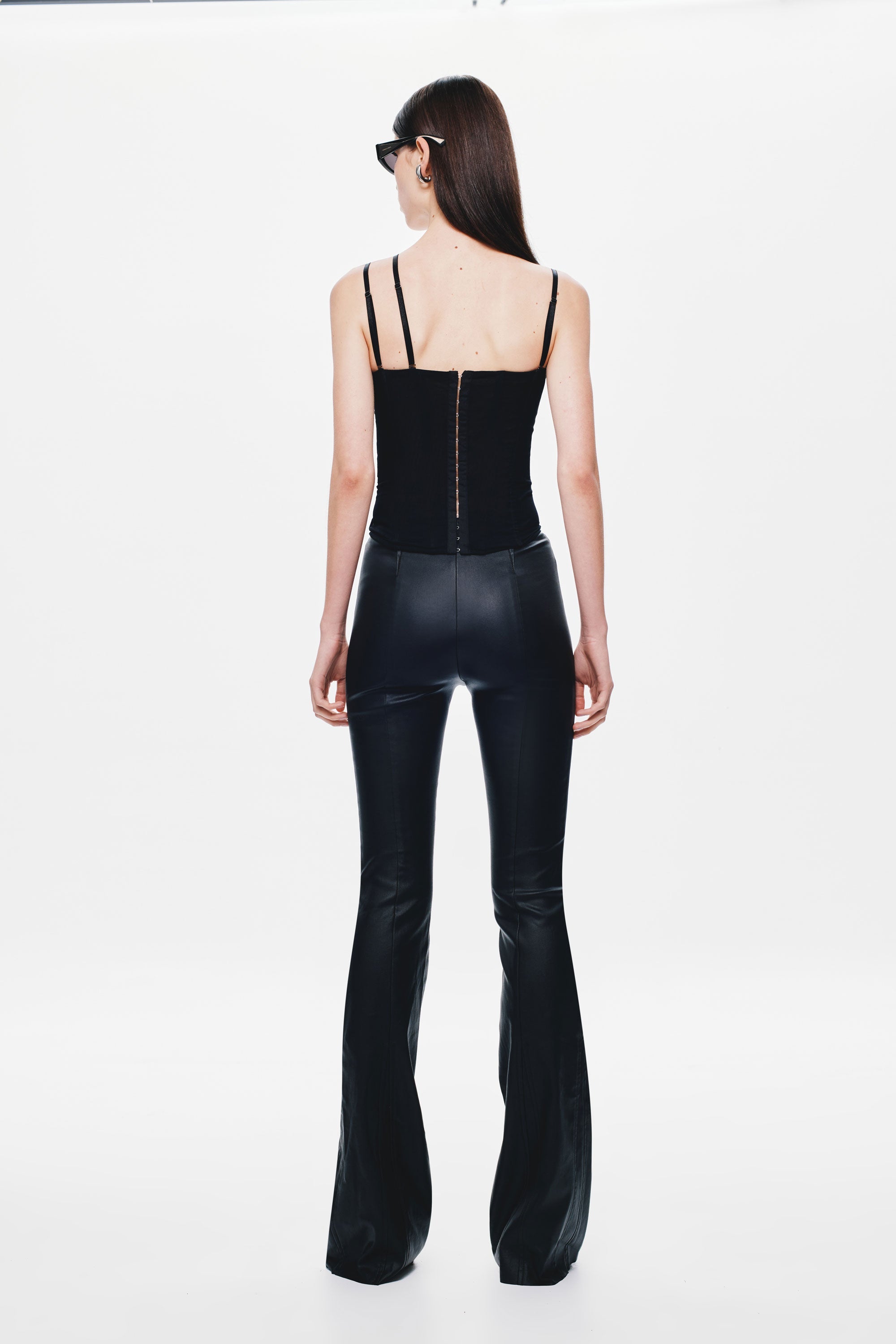 Black mesh corset top back with crisscross straps and center zipper