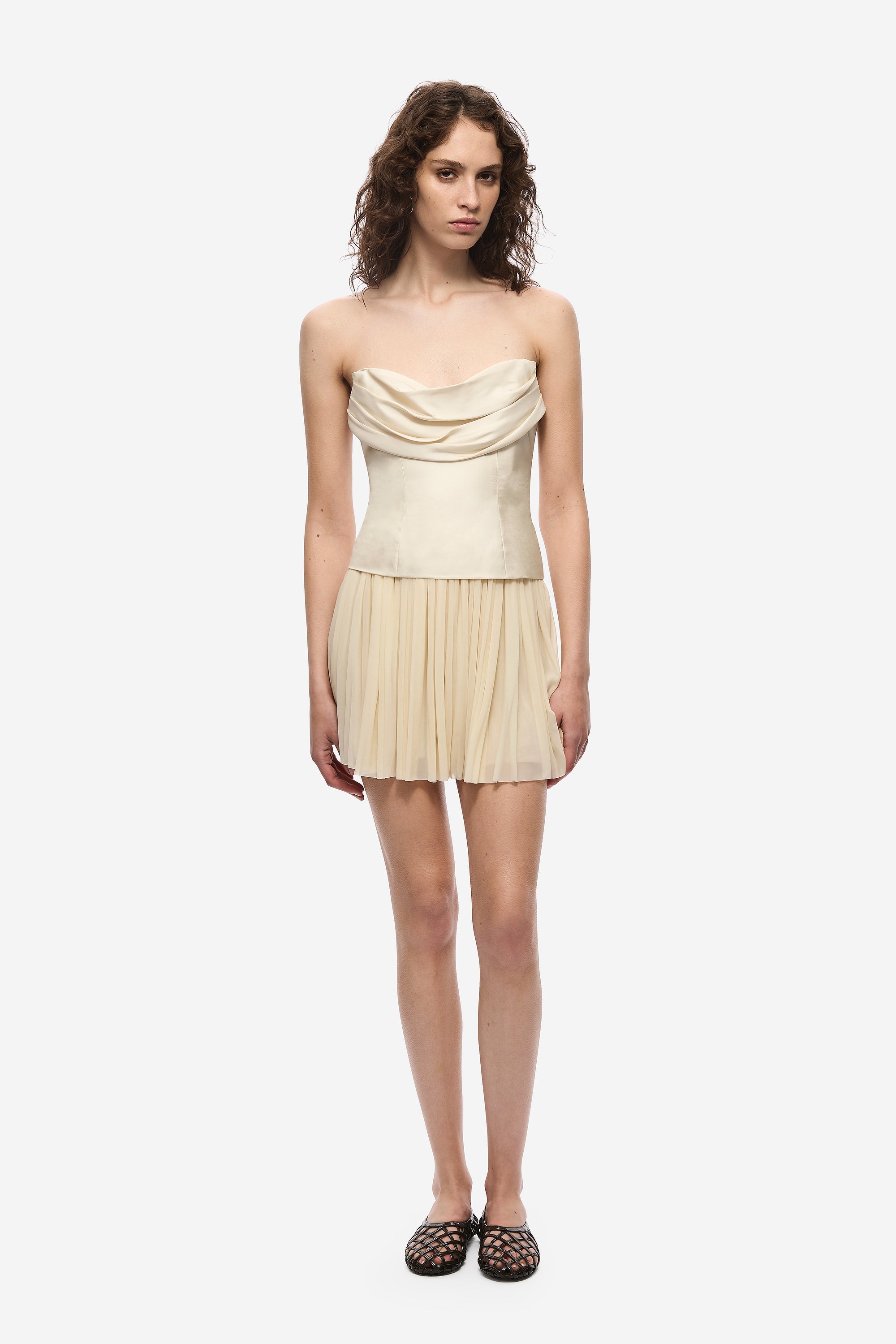 Pearled ivory silk bustier with draped neckline and pleated waist peplum