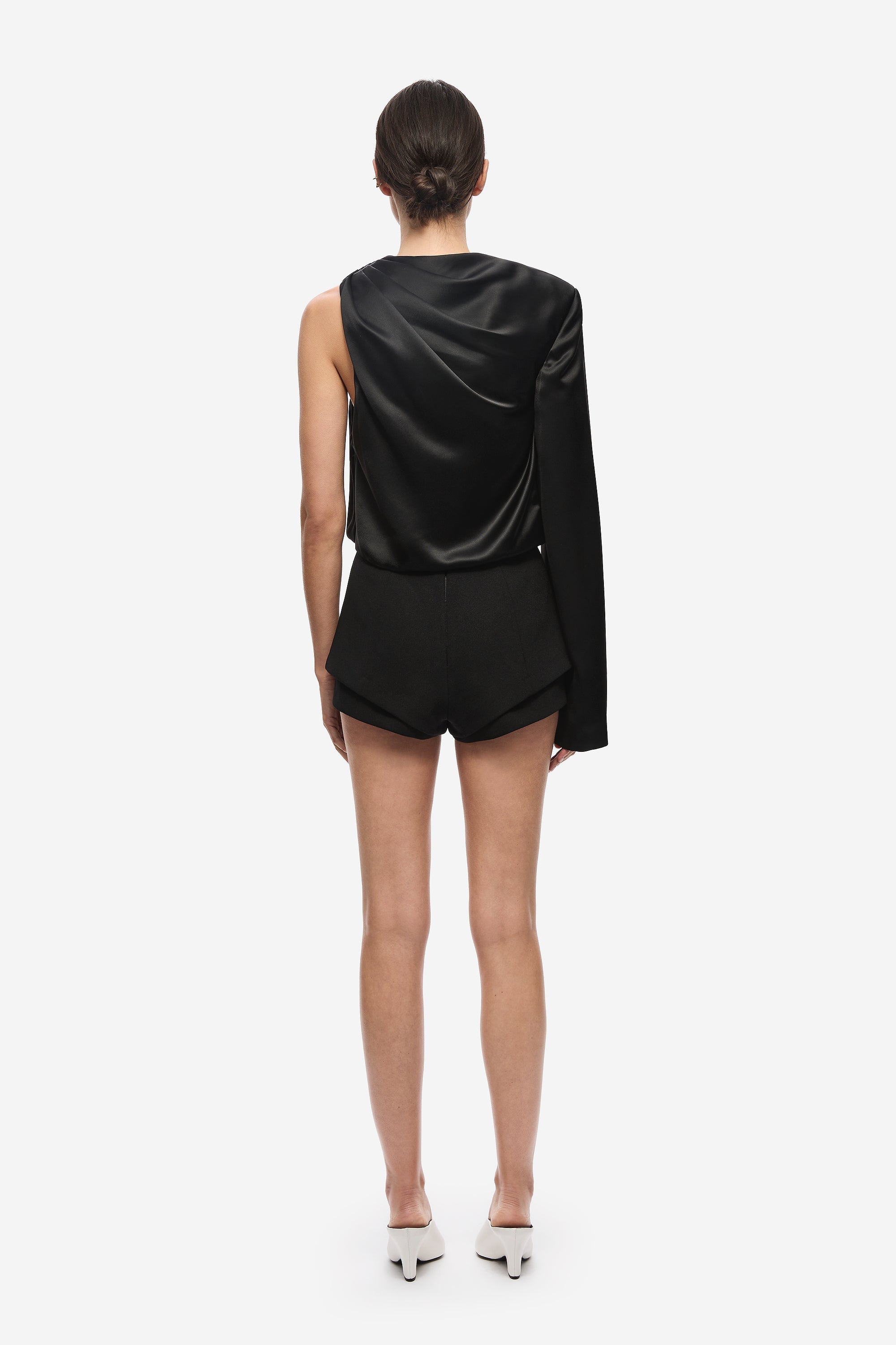 Black satin sleeveless top with high neck back drape