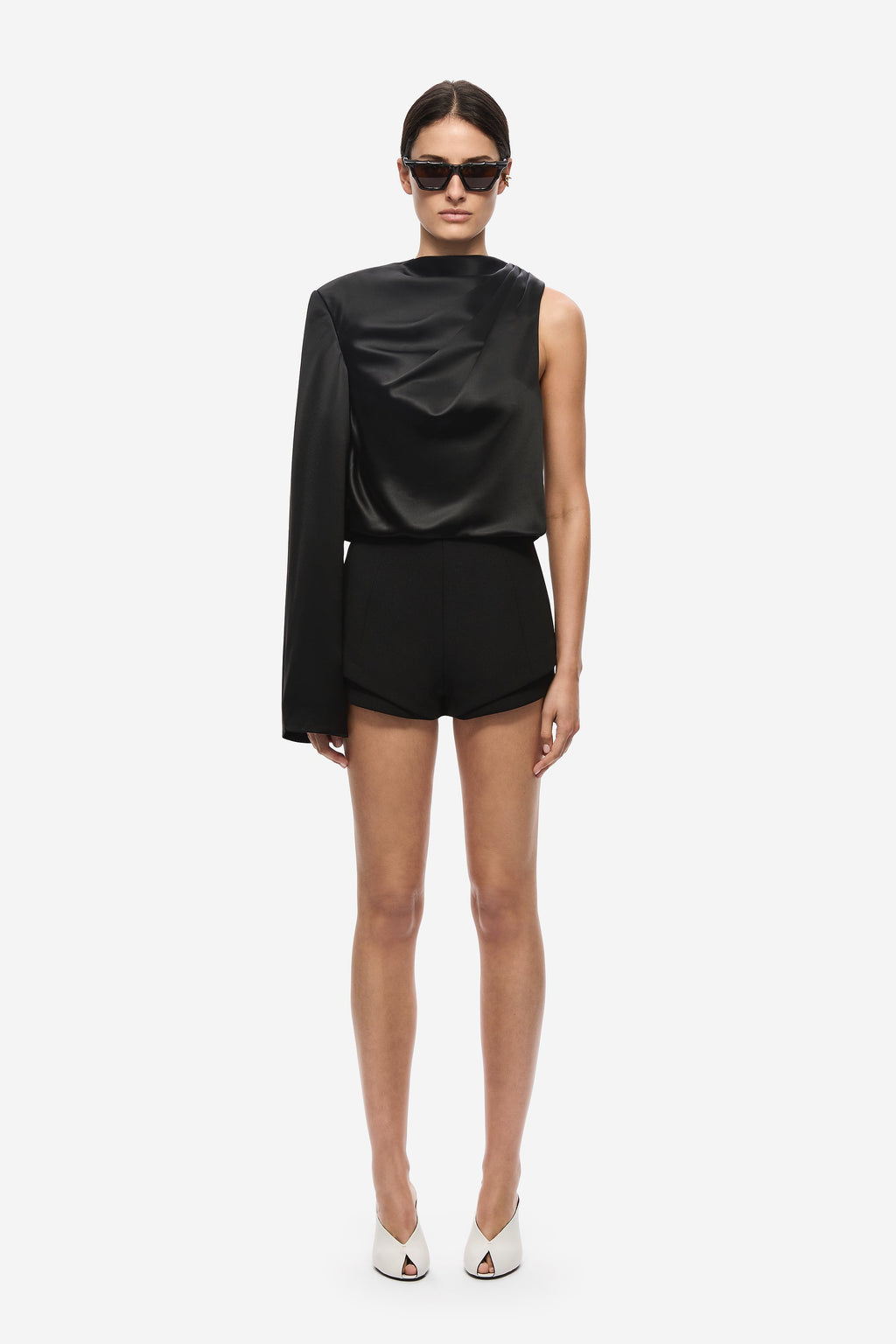 Black satin sleeveless top with high neck drape