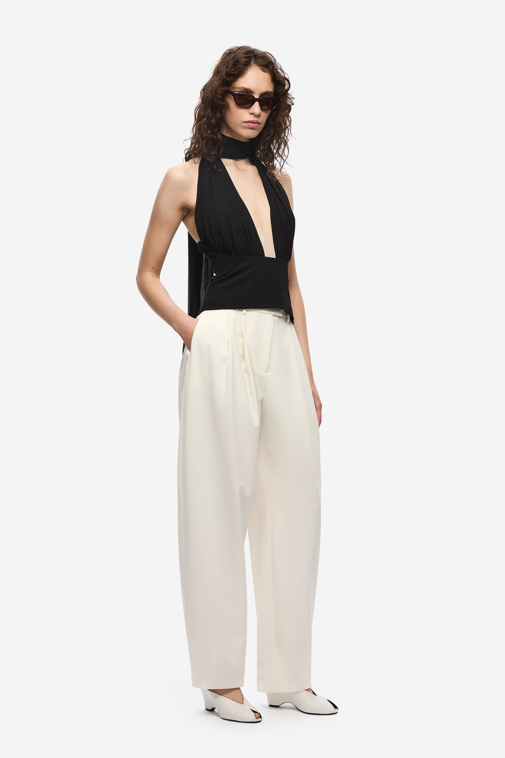 Black halter silk top with deep V neckline and open chest cutout