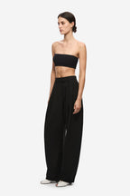 Black bandeau knit top with wide strapless band, fitted profile
