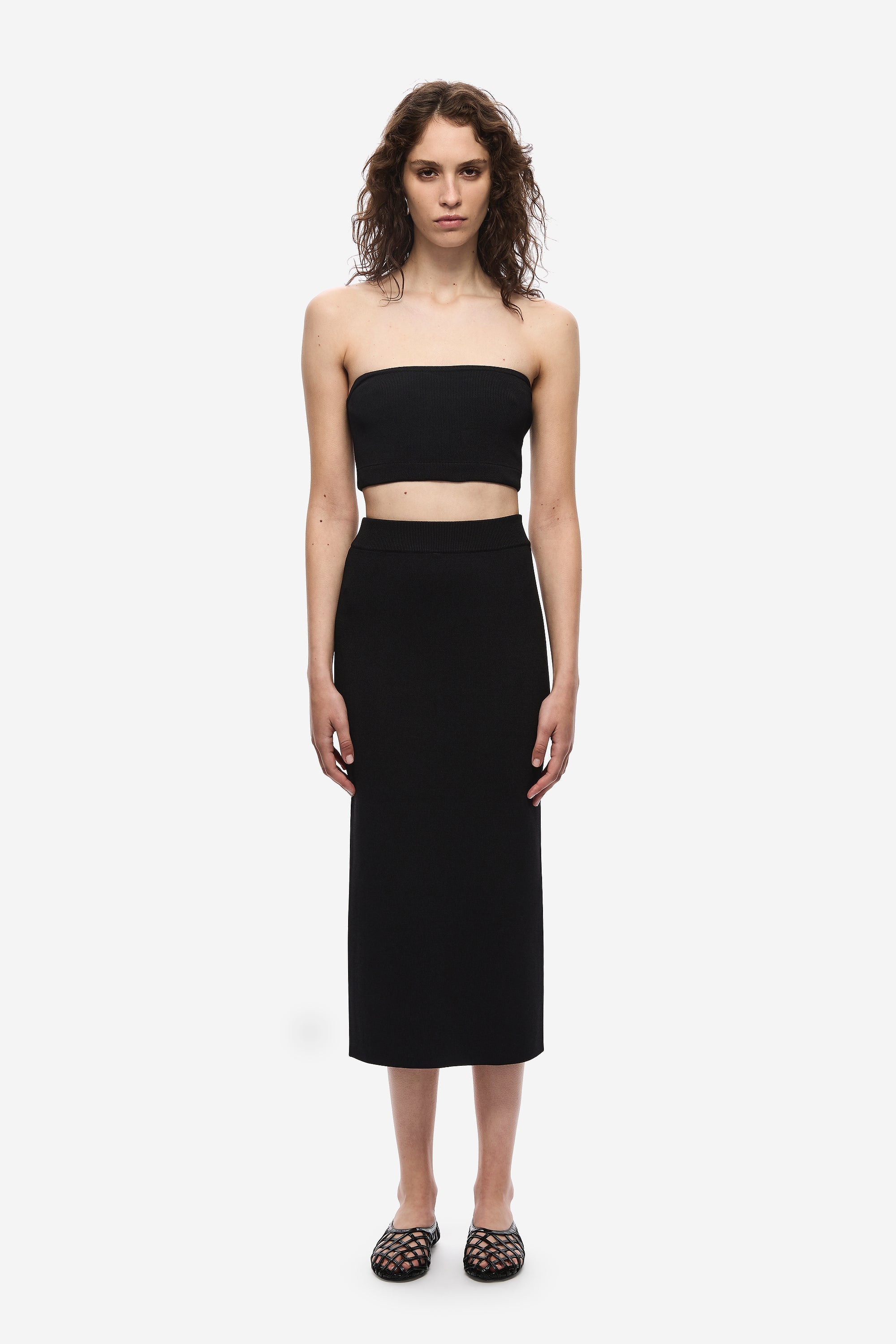 Black knit column midi skirt with high waistband, front view