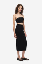 Black knit column midi skirt with high waistband and straight silhouette