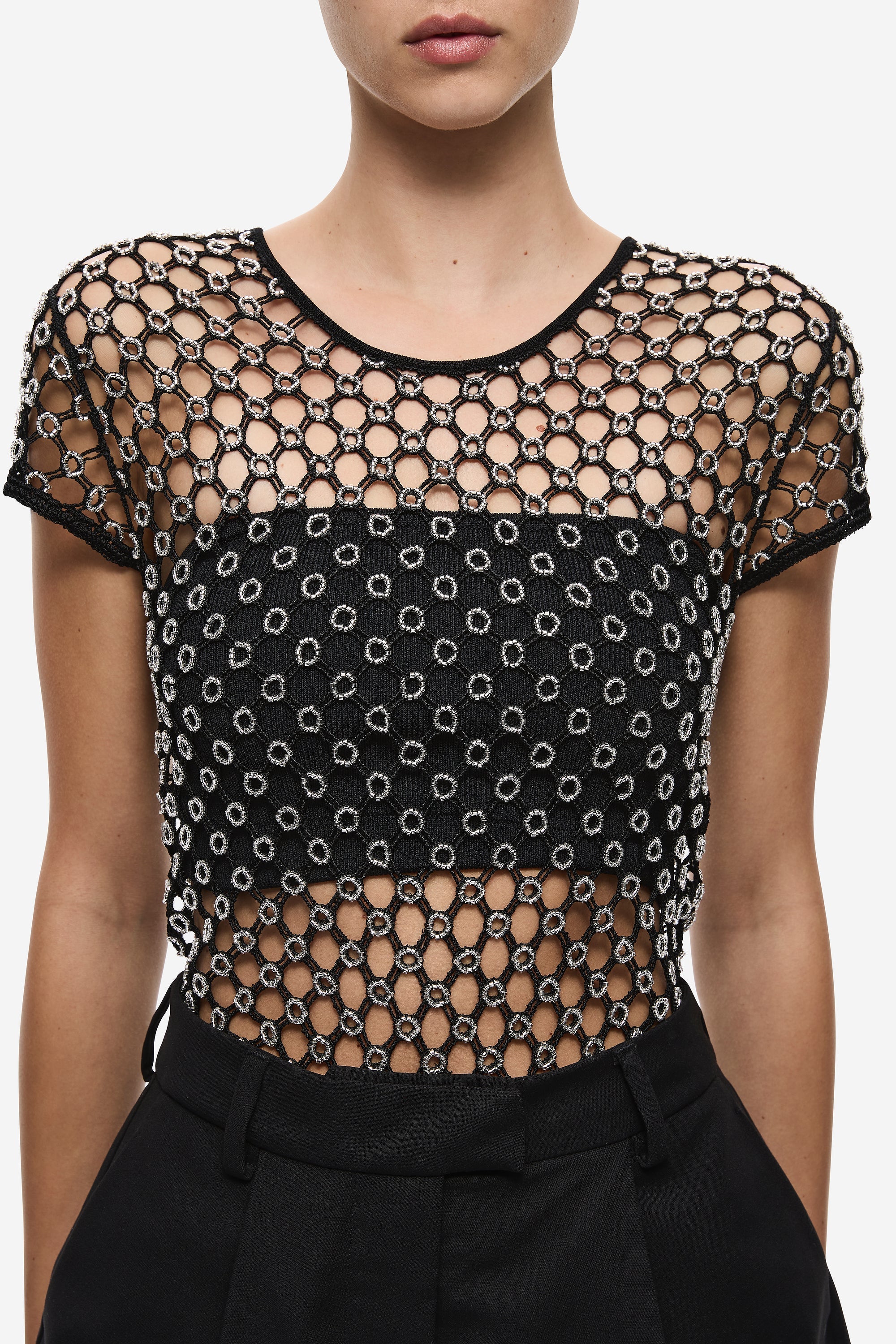 Black beaded crochet cropped tee detail, round neck and chain-dot beading pattern.