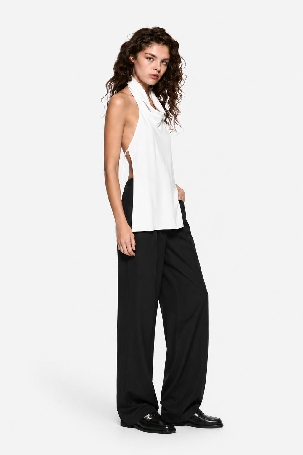 Ivory silk apron-style halter top with draped front and sleeveless cut