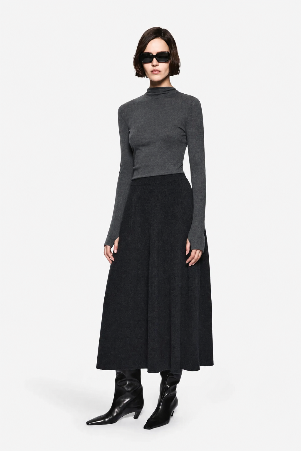 Women's merino A-line midi skirt in dark charcoal, high rise, flared hem