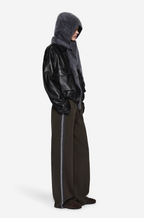 Merino knit pants in dark hunter green with blue side stripe, relaxed wide-leg fit