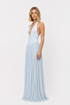 Light blue sleeveless jersey maxi dress with deep V neckline and flowing pleated skirt