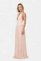 Soft pink sleeveless jersey maxi dress with deep V neckline and flowing pleated skirt