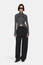 Dark charcoal TENCEL long-sleeve twist top with draped neckline and asymmetrical hem.