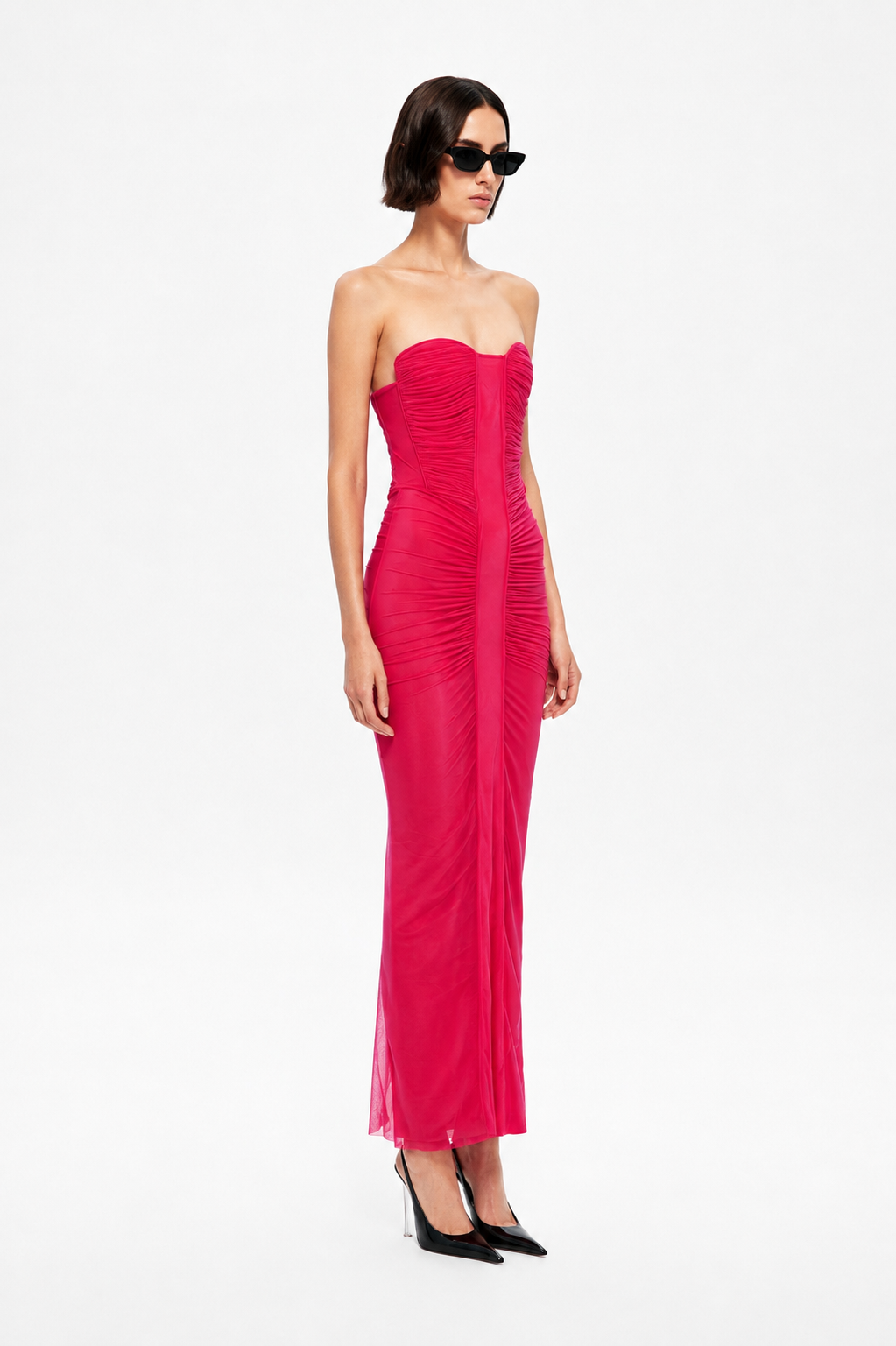 THE TOTEM cerise strapless midi dress with ruched jersey texture and side slit, profile